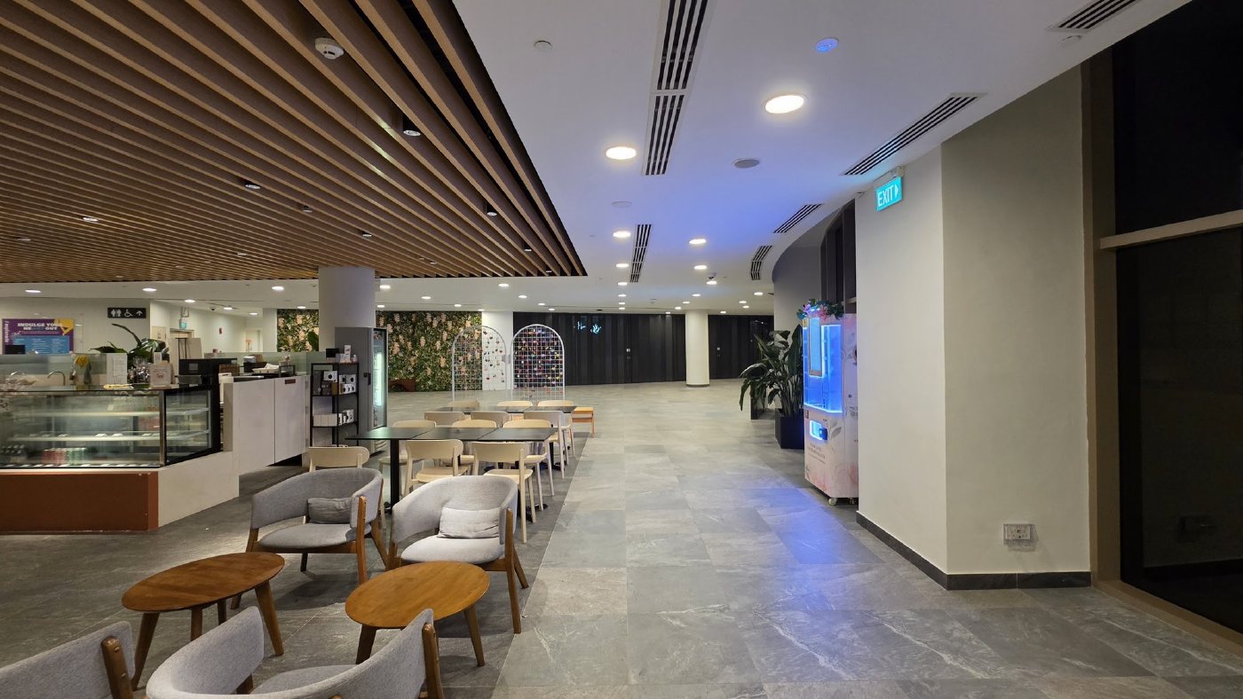 Wide view showing the DIY Medallion machine near the cafe seating