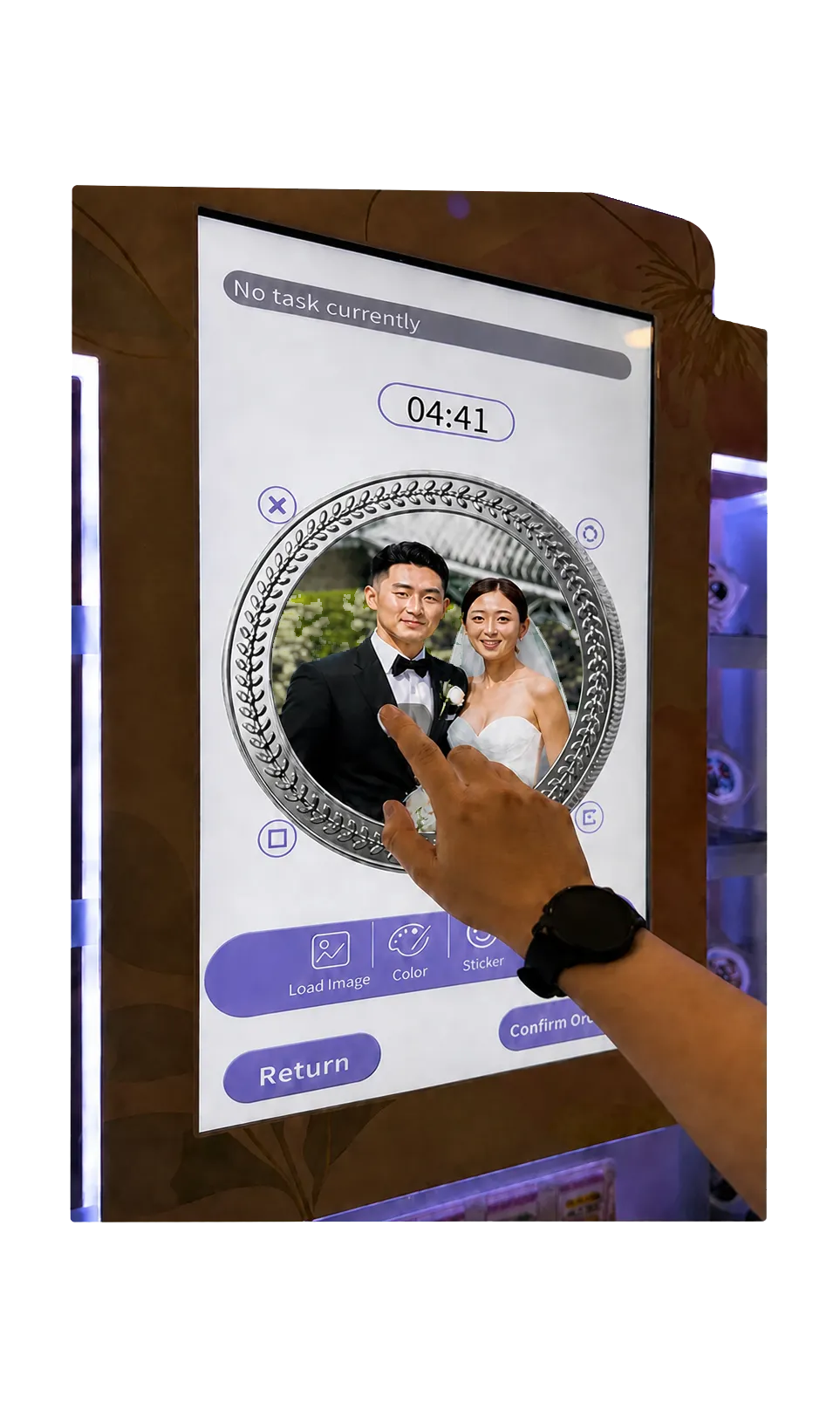 A photo being positioned on the medallion design screen